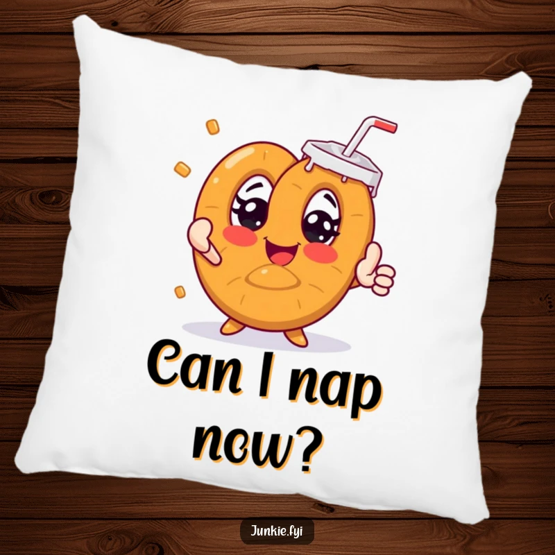 Funny pretzel character with wide eyes reaching for a giant soda, decorating a soft, plush pillow.