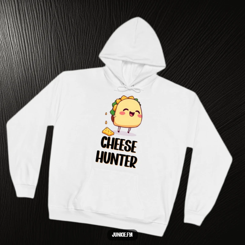 Funny giggling taco character with small legs reaching for falling cheese, depicted on a hoodie.