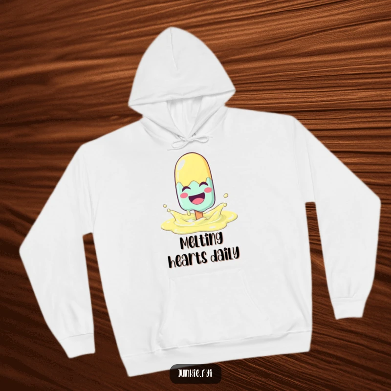 Funny popsicle character laughing and melting with joy while splashing in a lemonade puddle on a warm hoodie.