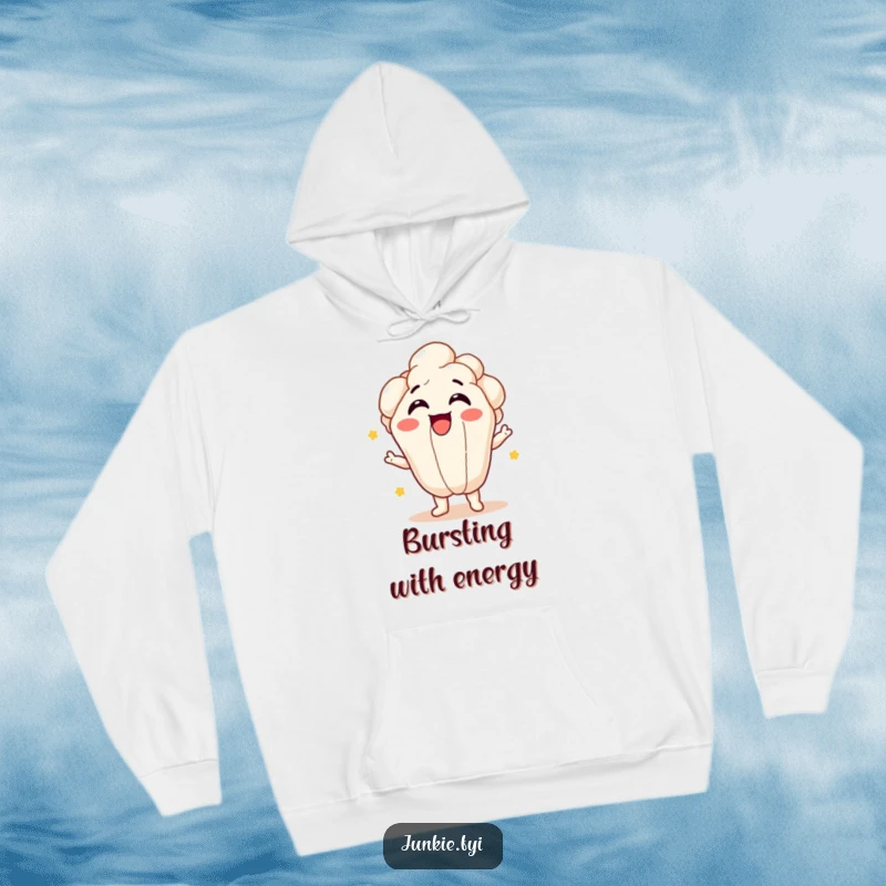 Funny popcorn kernel character giggling and bursting with delight in a cozy hoodie, embodying cheerful warmth.