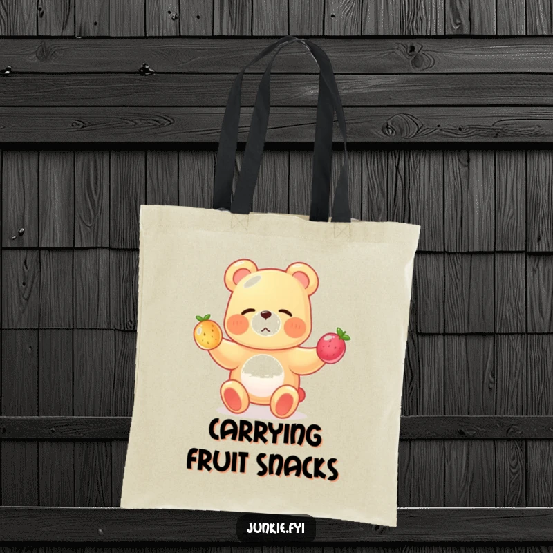 A winking gummy bear juggles tiny fruits on this funny tote bag, making it a cheerful accessory.